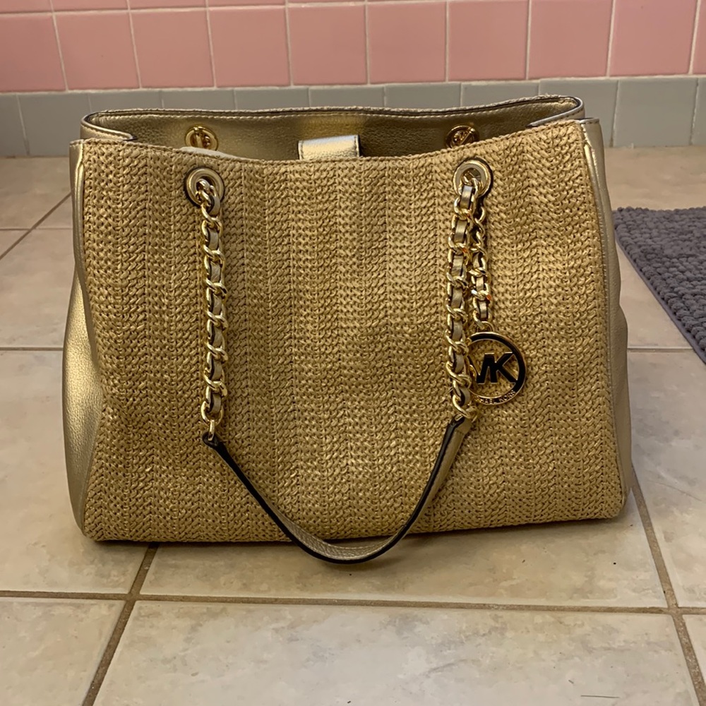 Never used golden Micheal Kors large purse